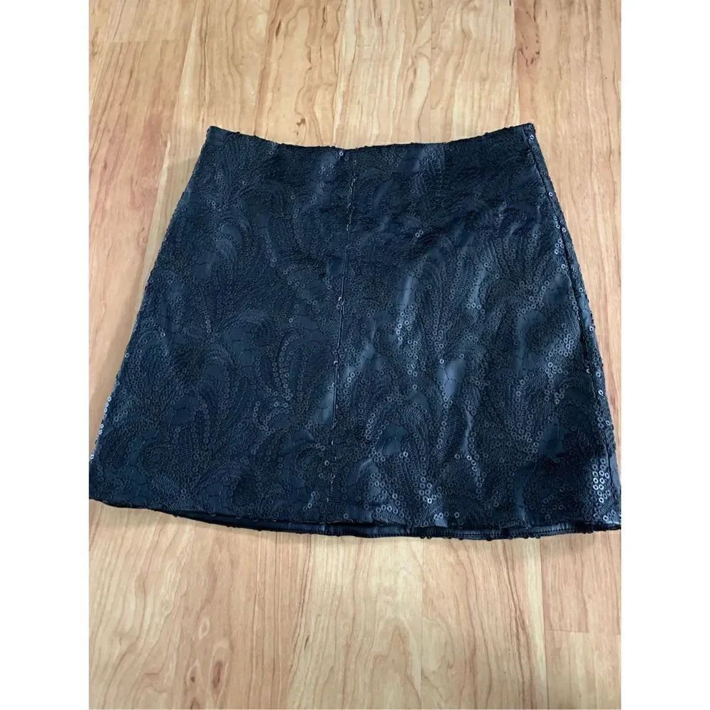 Black faux leather mini with sequence size 24